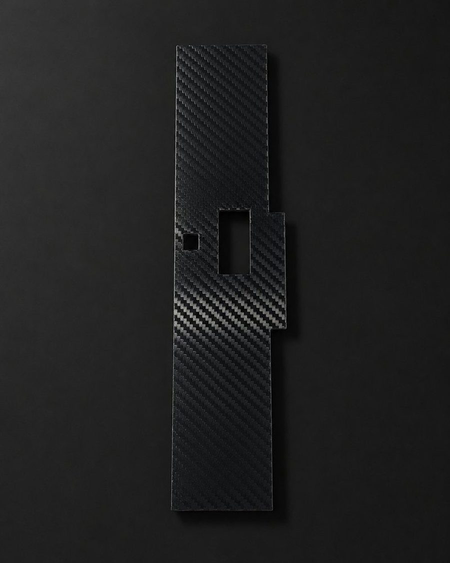 The RL-1001 shifter dust bezel in carbon fiber look, studio shot.